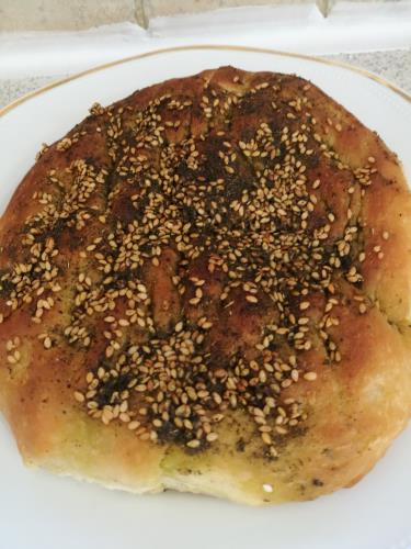 פיתה עם זעתר או פיצה 